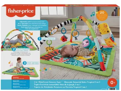 Box mit Baby auf bunter Spieldecke